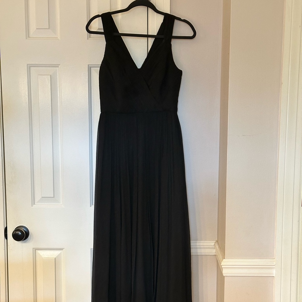 One long, black J Crew evening gown. 100% silk size 4.